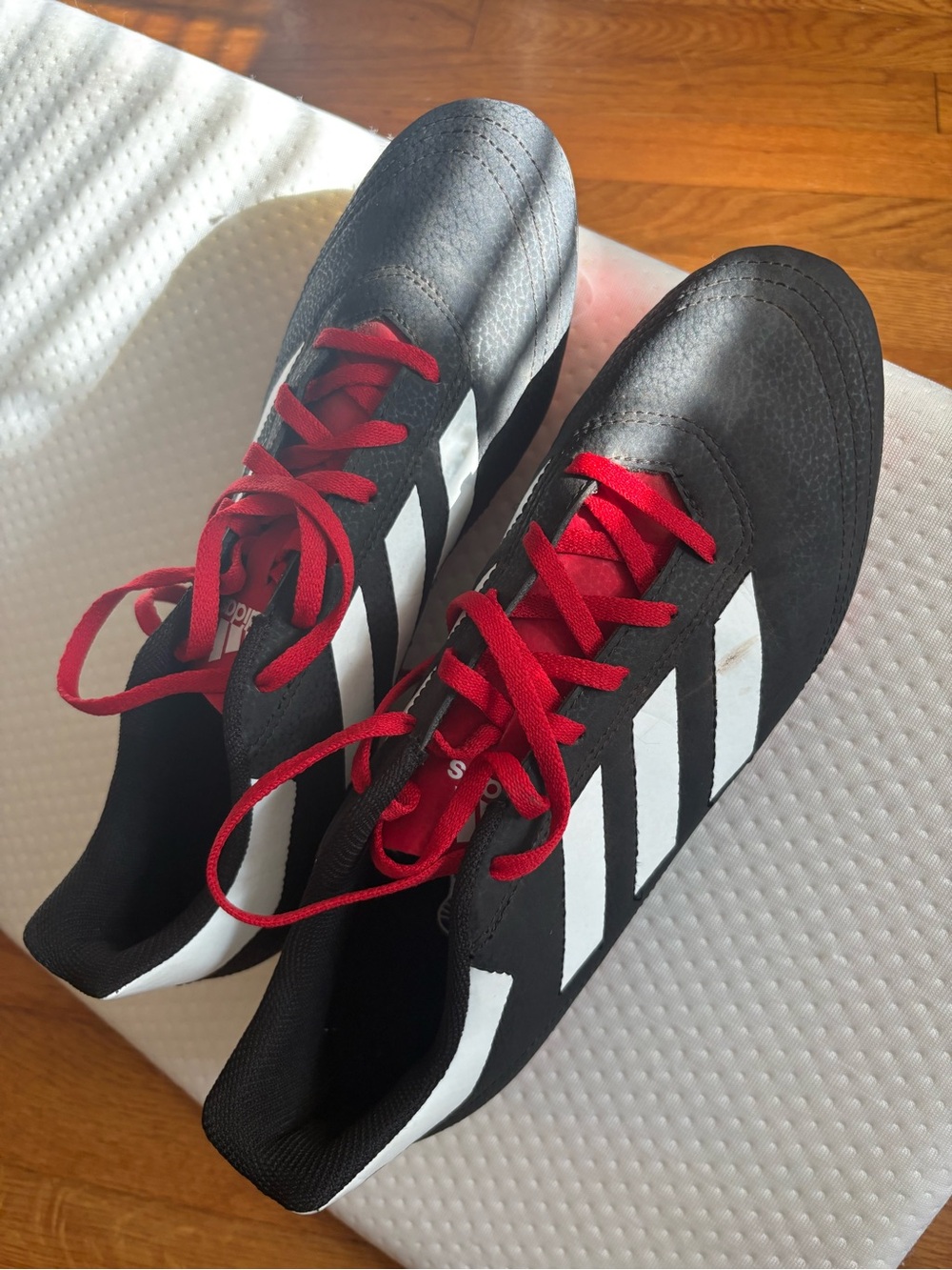 adidas Men's Black and White Athletic Shoes  Cleats with Red Laces